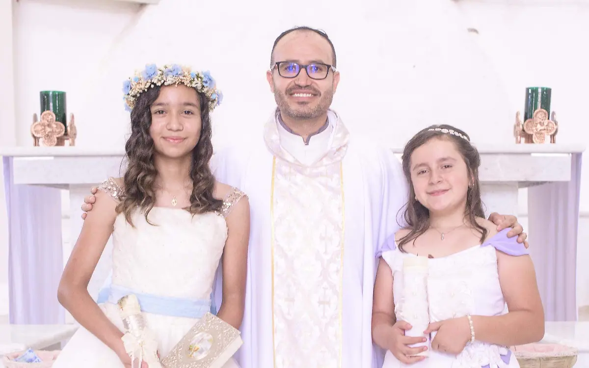 Primera comunión de las primas Mariana y Matilde