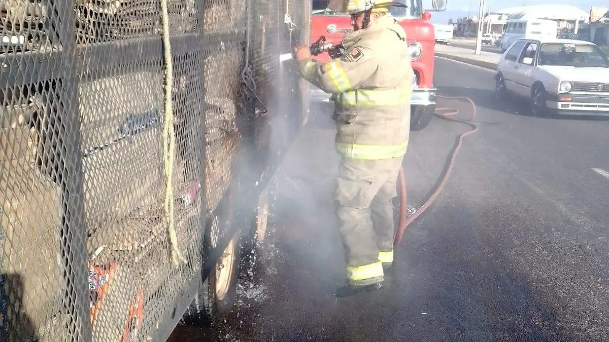 INCENDIO EN REMOLQUE