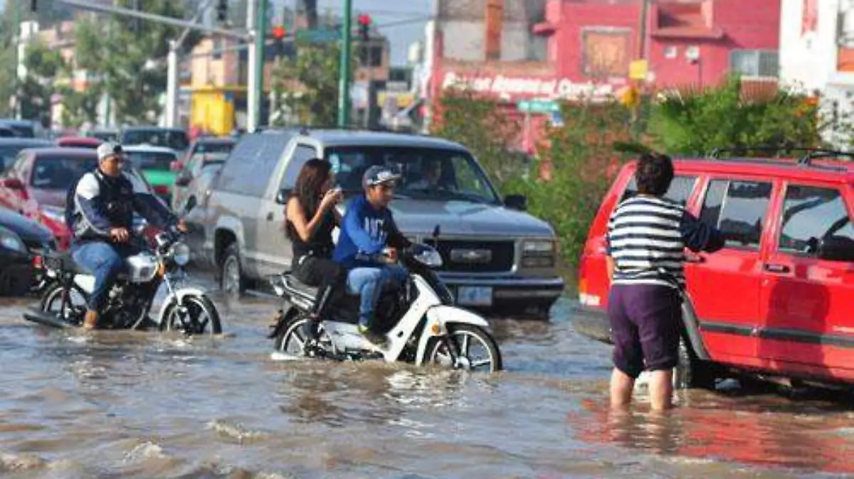 LUVIA Y CARMELITAS INUNDADAS OK