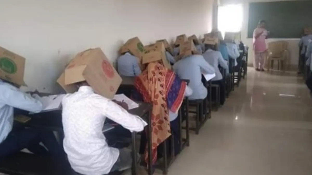 05 Colocan cajas de cartón para que alumnos no copien en examen