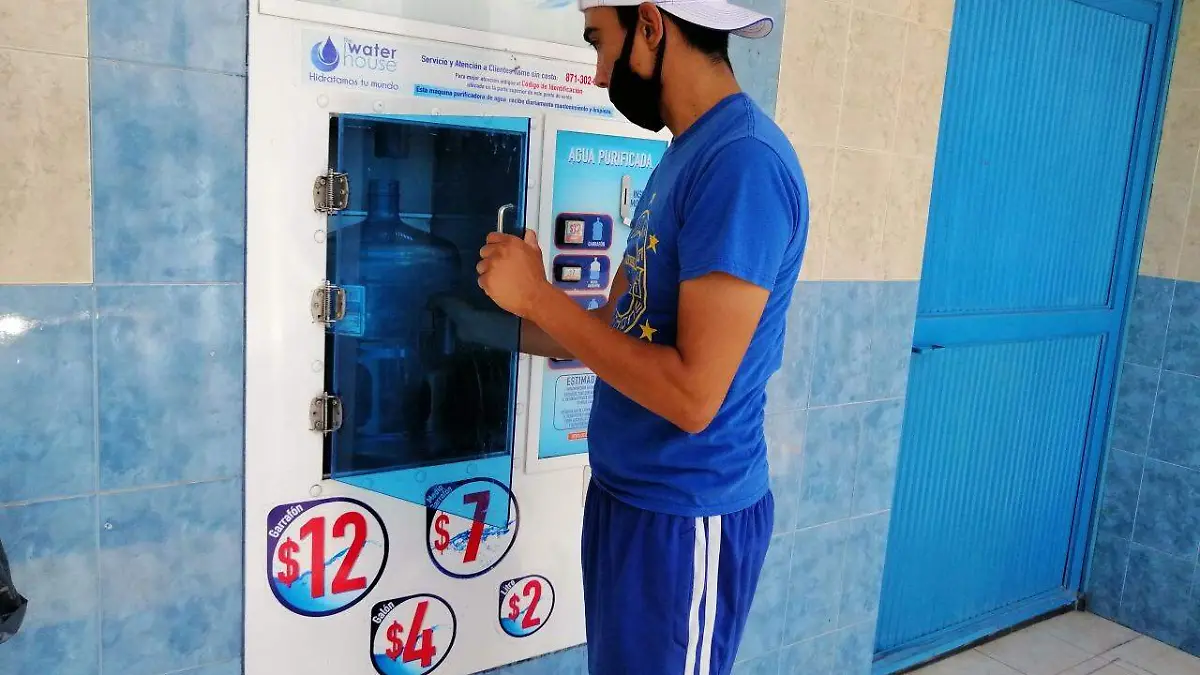 Maquina expendedor ade agua purificada