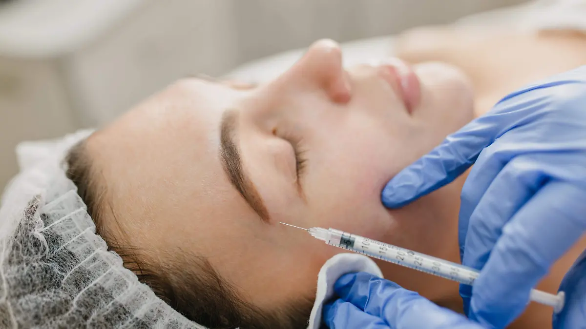 closeup-portrait-injection-face-pretty-woman-botox-procedures-salon-professional-work-hands-blue-gloves-doctor-rejuvenation-modern-medicine-making-beauty-healthcare
