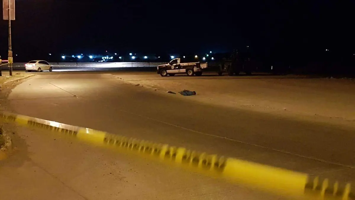 el hombre estaba con heridas de arma de fuego y atado d emanos