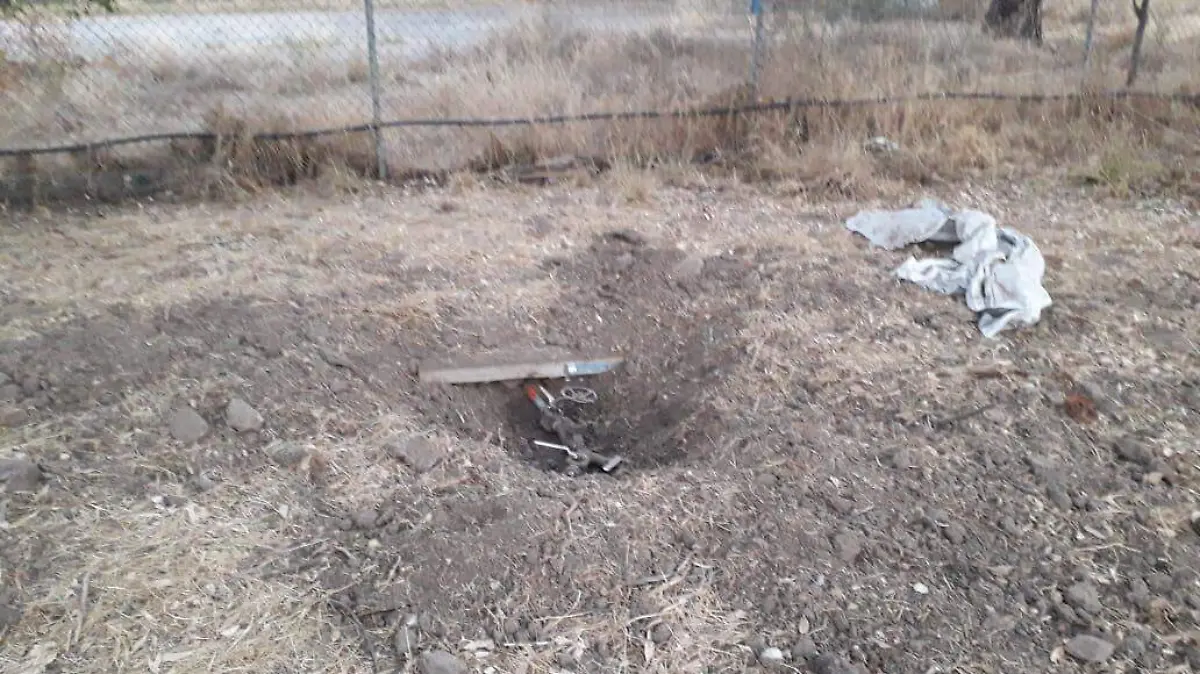 la toma estaba enterrada en un predio