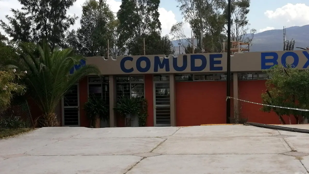 COMUDE