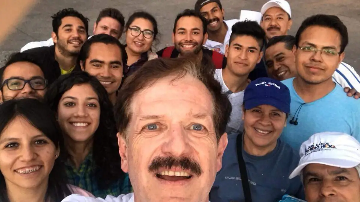 Juan Carlos y su equipo