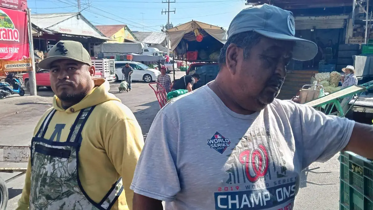 Vendedores de sandias y lechugas