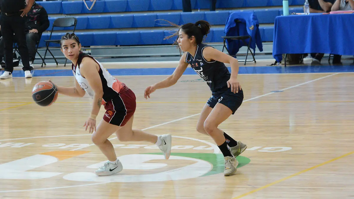 La basquetbolista....