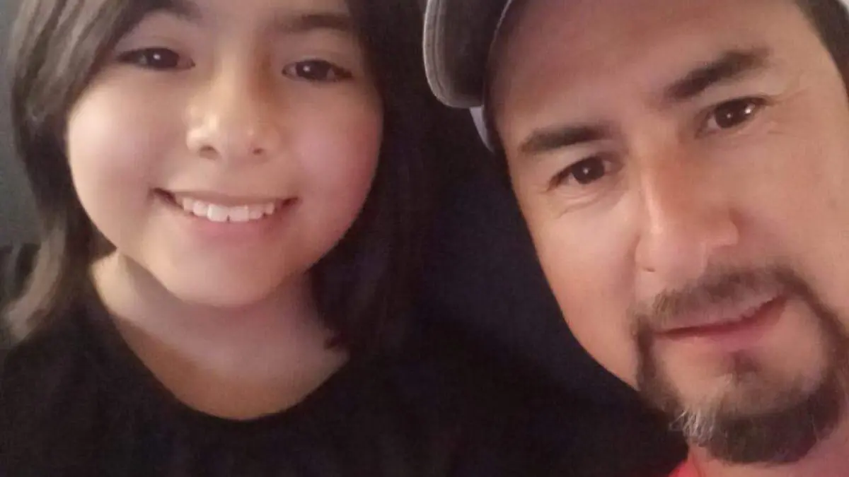 Rubén Torres y su hija