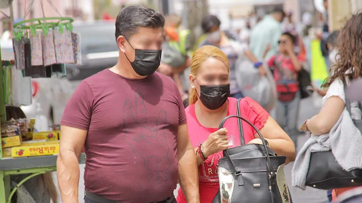 personas con cubrebocas