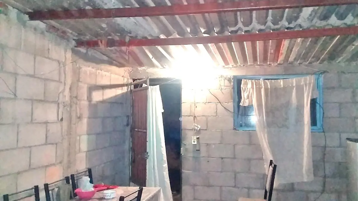 casa de la esposa del agresor