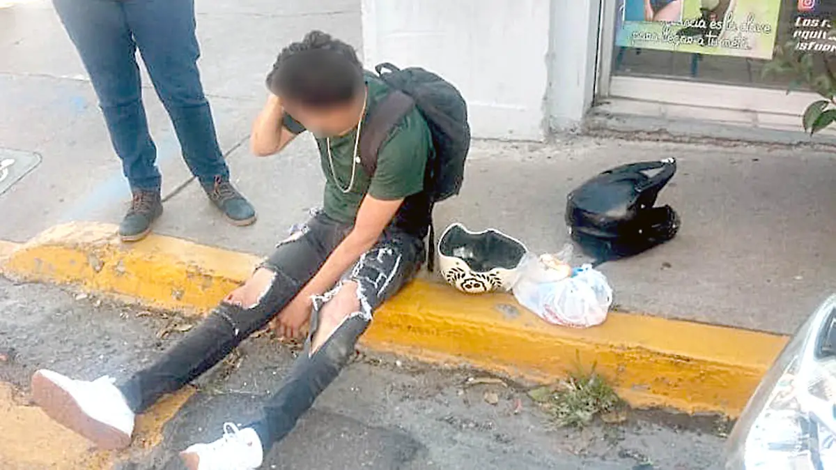 Motociclista lesionado