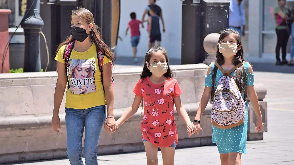 personas con cubrebocas