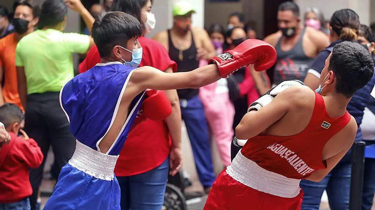 boxeadores con cubrebocas