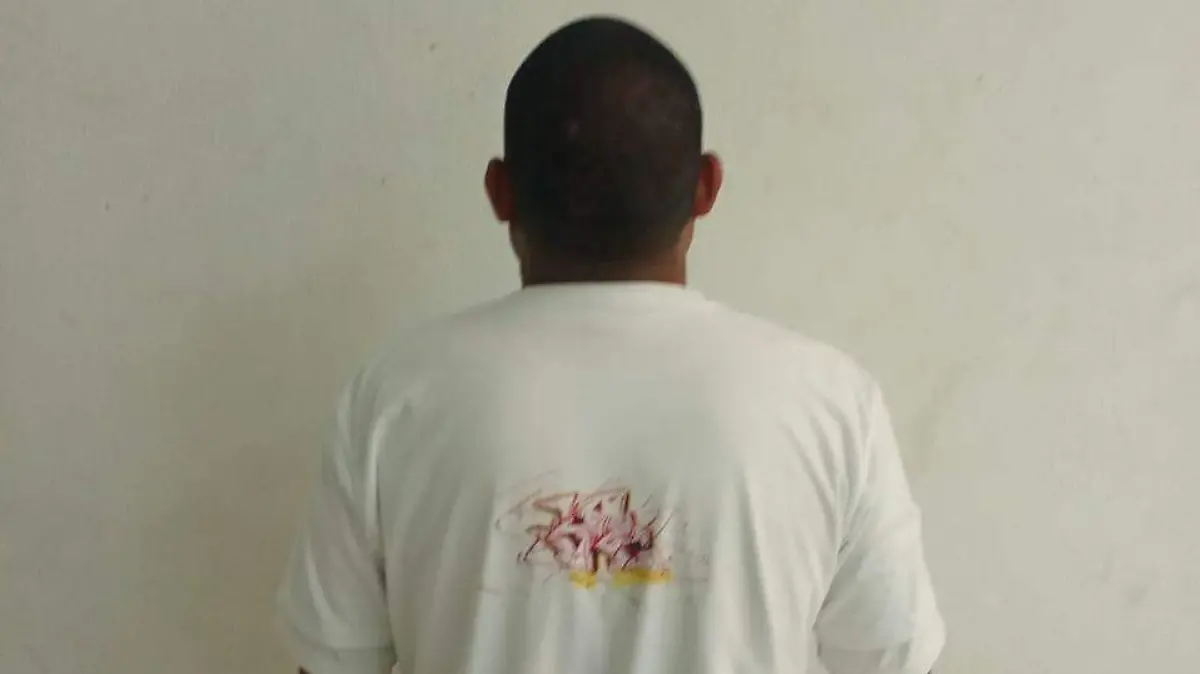 DETENIDO.FOTOGRAFÍAS INAPROPIADAS