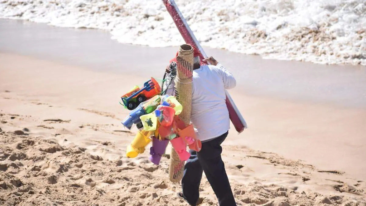 vendedores de playa