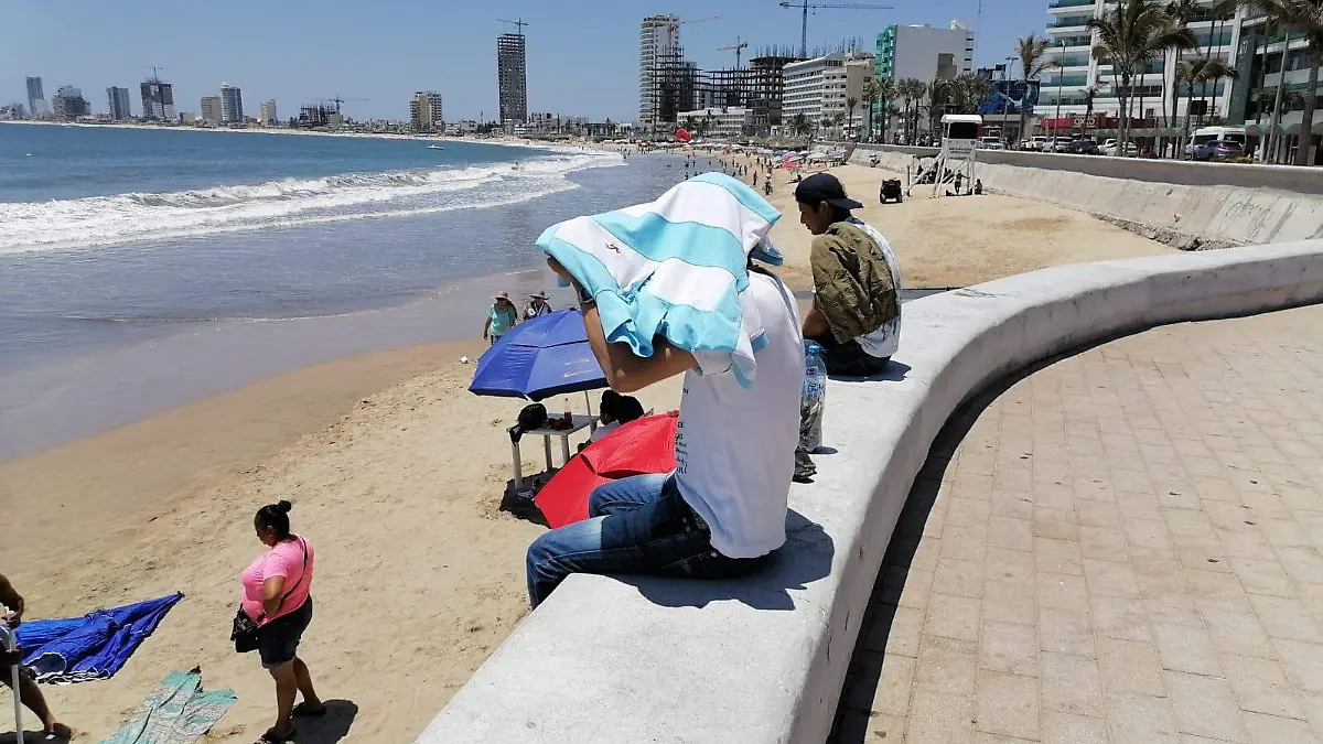 calor-sol-tematica-malecon