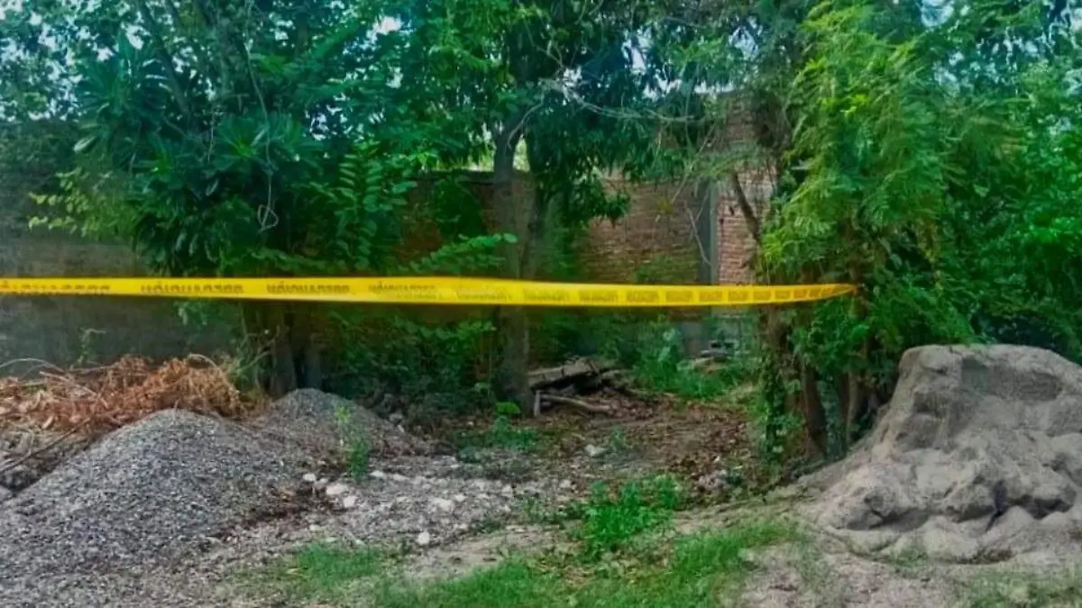 mujer ejecutada maza
