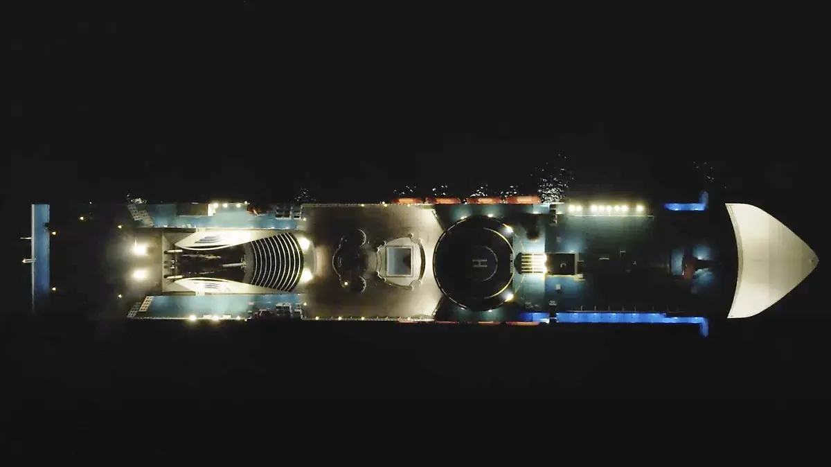 Aerial Drone footage of cruise ship at night