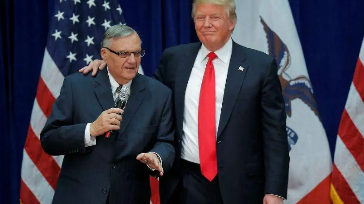 2017-08-26T140015Z_1680975579_RC19EC47D500_RTRMADP_3_USA-TRUMP-ARPAIO