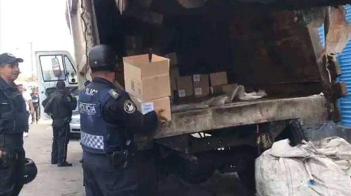 mercancia-robada-en-camión-de-basura