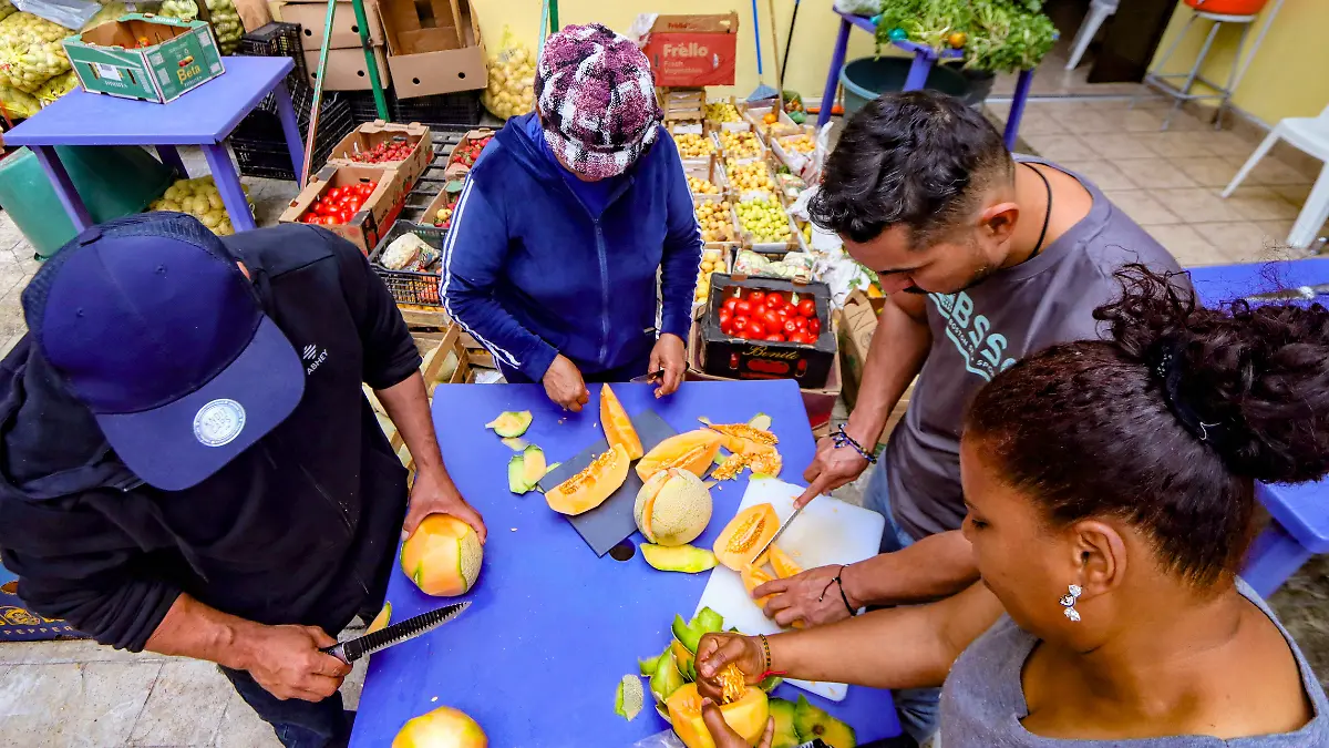Migrantes alimentos refugio Arcángel Rafael
