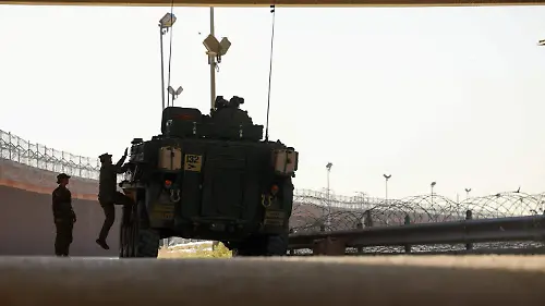 2025-06-13T100702Z_92193902_RC2XMEA295MA_RTRMADP_3_USA-TRUMP-MIGRATION-MILITARY