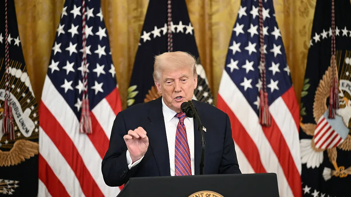 AFP__20250718__678N8TE__v1__HighRes__PresidentDonaldTrumpSignsTheGeniusActGuidingAnd (1)