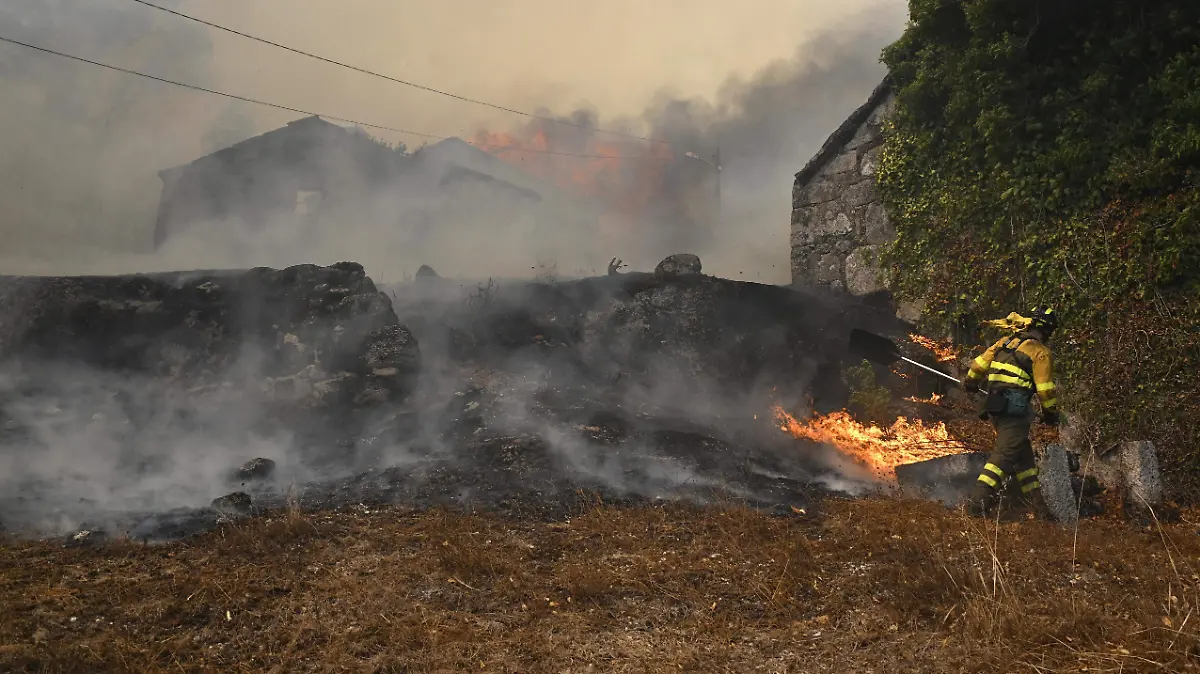 AFP__20250817__69RE2HE__v1__HighRes__SpainWildfireClimateWeather