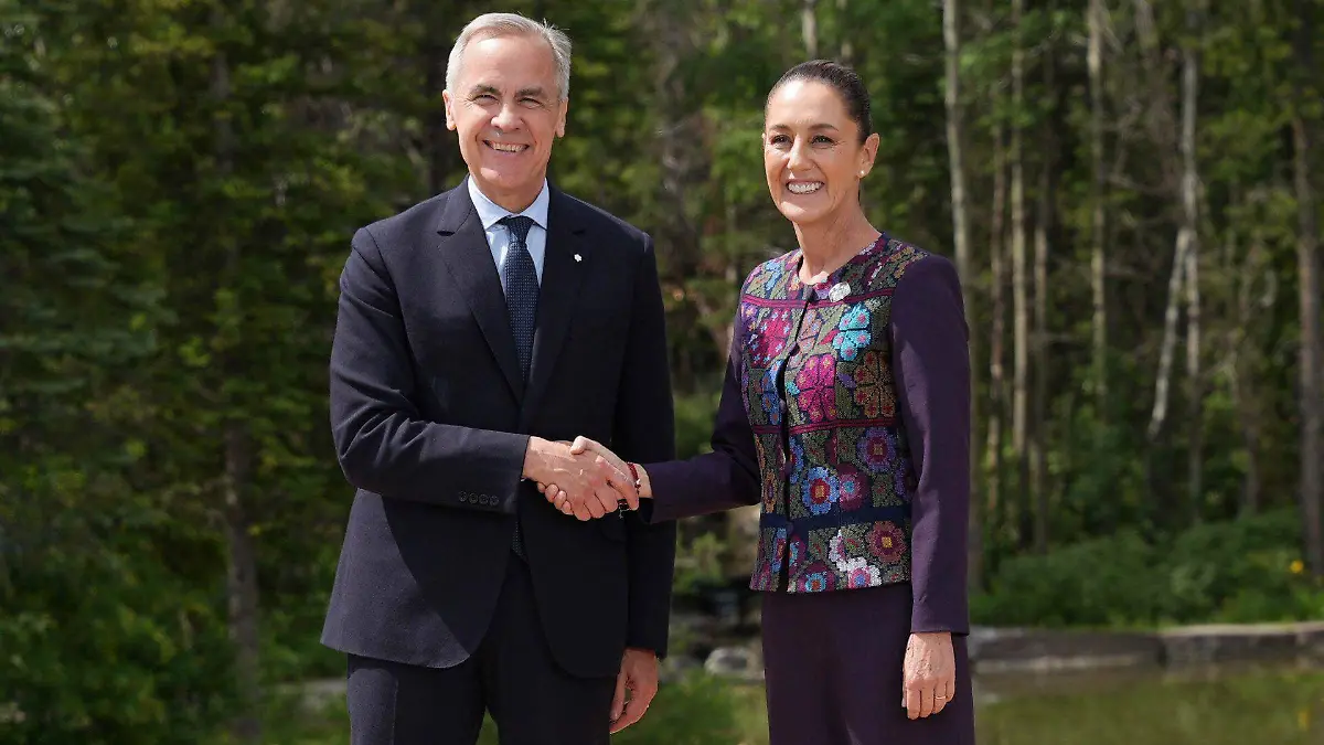 1036760_Claudia Shienbaum y Mark Carney_web