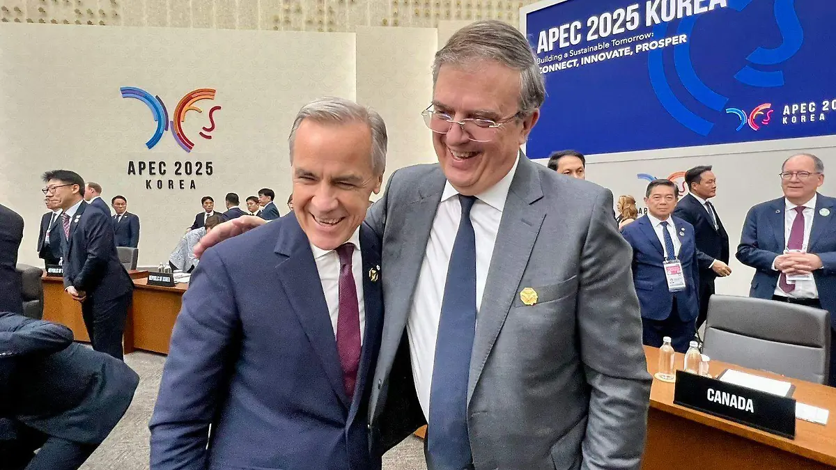 Marcelo Ebrard y Mark Carney