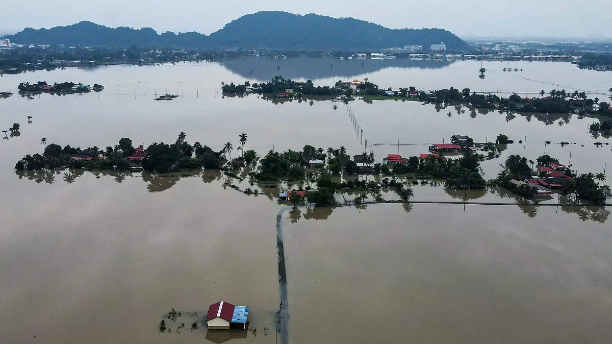 AFP__20251128__86F82Y3__v3__HighRes__TopshotMalaysiaThailandFloods
