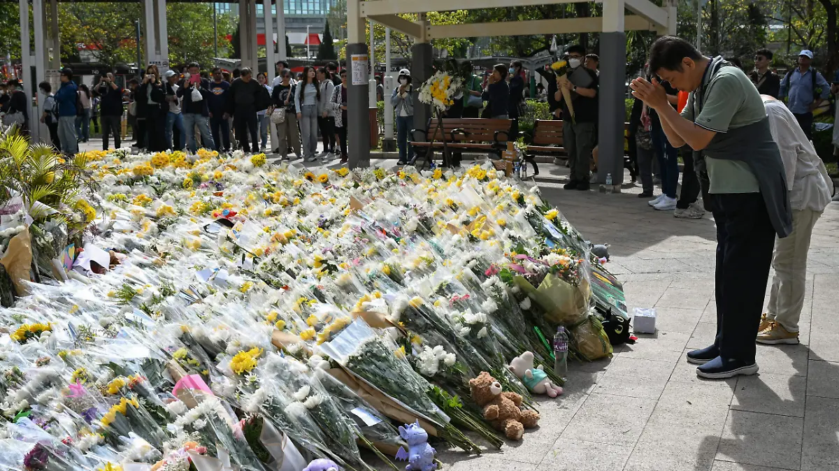 AFP__20251201__86N86EJ__v2__HighRes__TopshotHongKongChinaFire