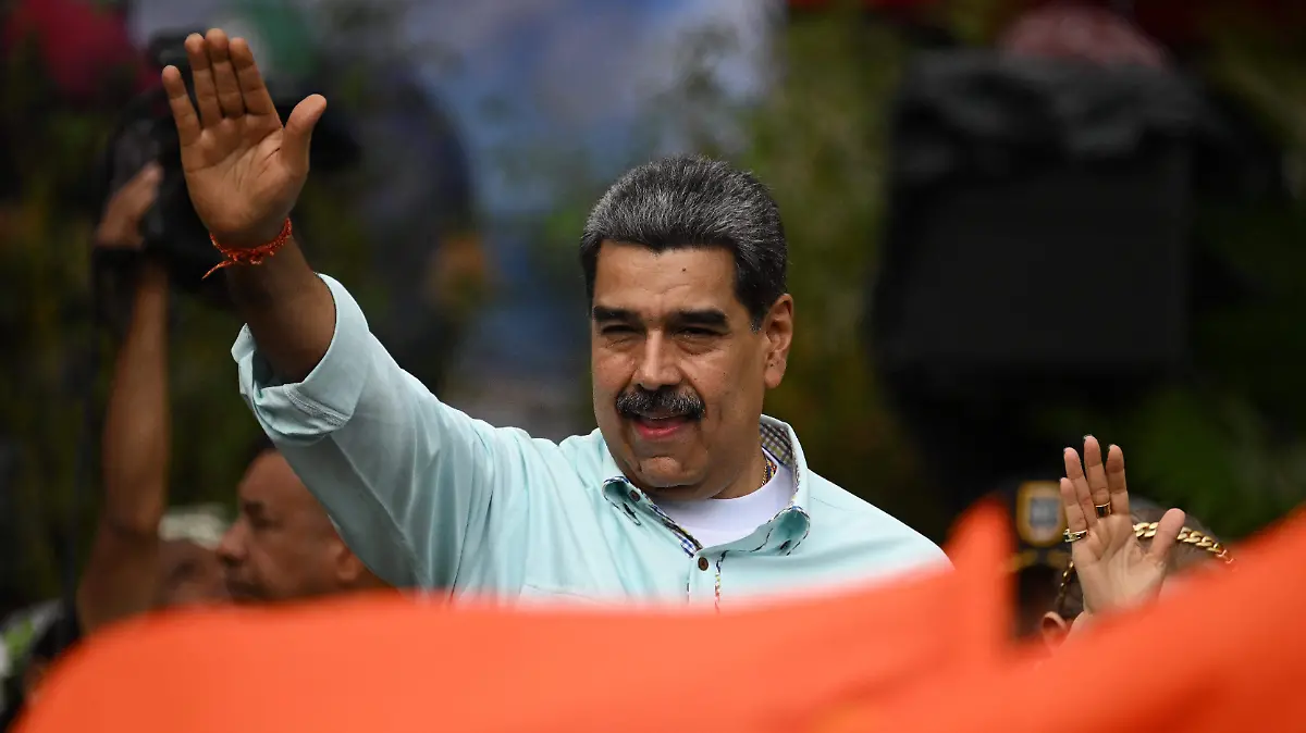 AFP__20251210__87QZ9G3__v2__HighRes__TopshotVenezuelaGovernmentRally