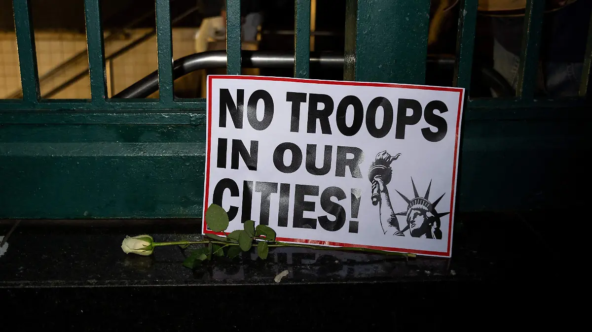 2026-01-08T023023Z_618528643_RC2NWIAO07DD_RTRMADP_3_USA-TRUMP-MINNESOTA-PROTEST