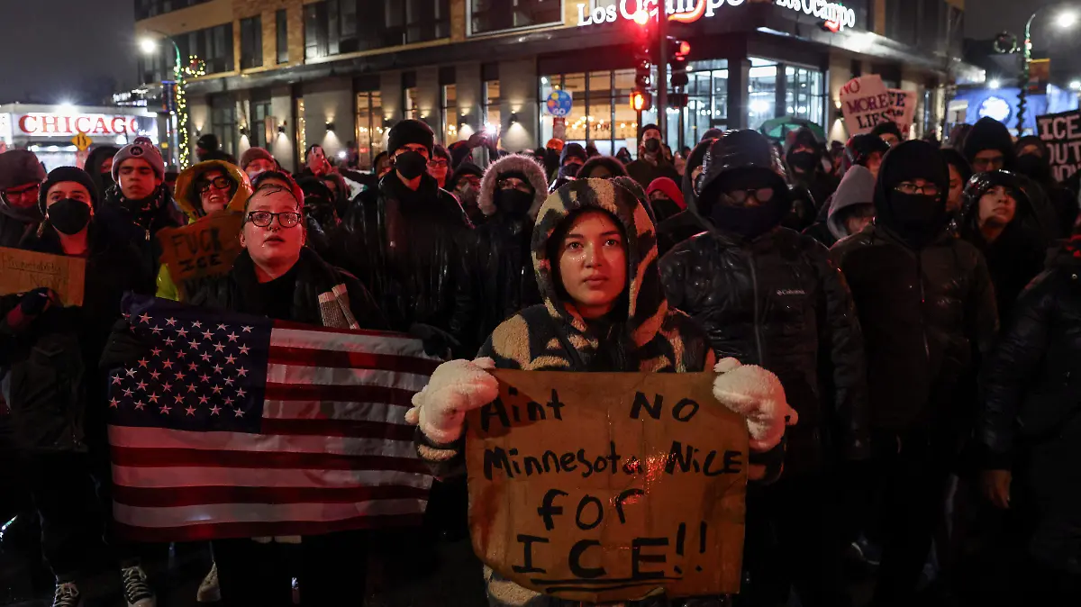 2026-01-09T021032Z_1165659679_RC2CXIA9GYMO_RTRMADP_3_USA-TRUMP-MINNESOTA