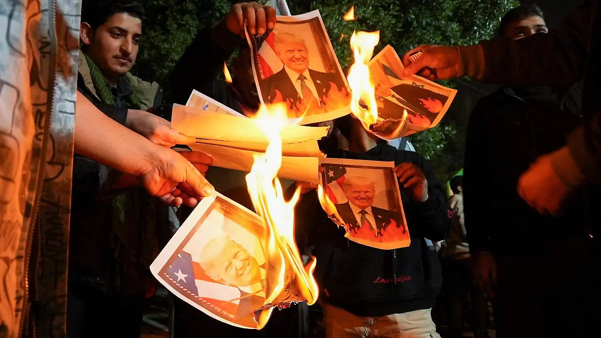 2026-01-13T190033Z_879565193_RC2I0JAM7TZB_RTRMADP_3_IRAQ-IRAN-PROTEST