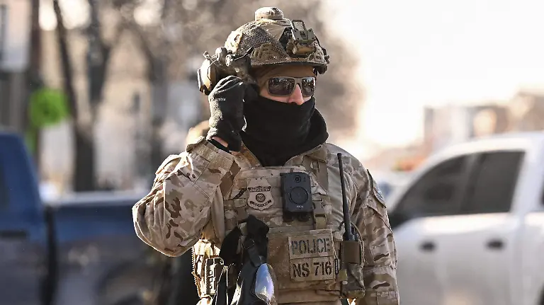 AFP__20260124__93VY2W9__v1__HighRes__ProtestsAfterUsImmigrationOfficerKillsWomanInMi