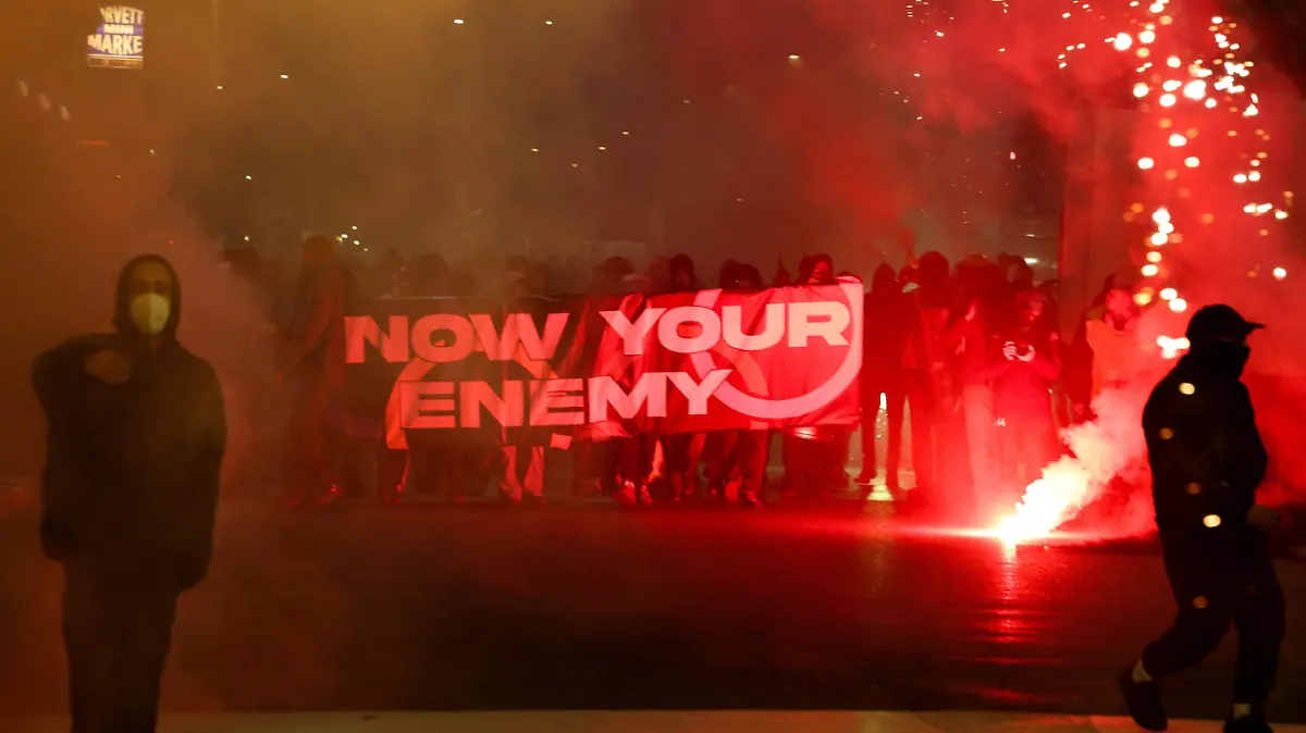 2026-02-07T173438Z_703664426_RC25HJAXJ3HE_RTRMADP_3_OLYMPICS-2026-PROTEST