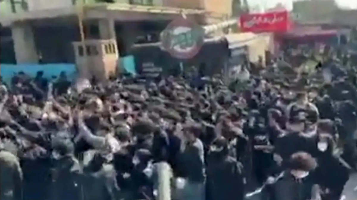 AFP__20260221__98GF7ZT__v1__HighRes__IranProtest