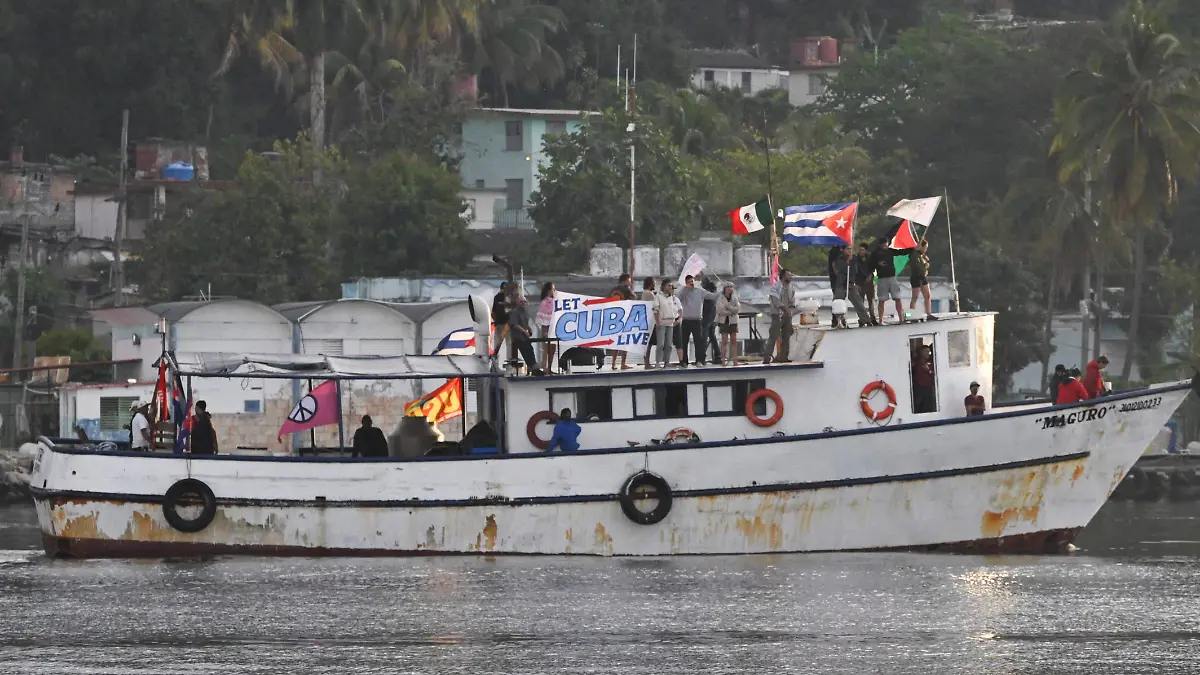 2026-03-25T004512Z_696408457_RC2YAKAAG55V_RTRMADP_3_CUBA-CRISIS-AID-RECEPTION