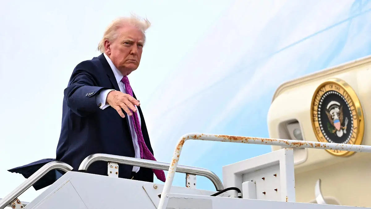 AFP__20260329__A64U6XK__v1__HighRes__UsPresidentDonaldTrumpReturnsToWhiteHouse