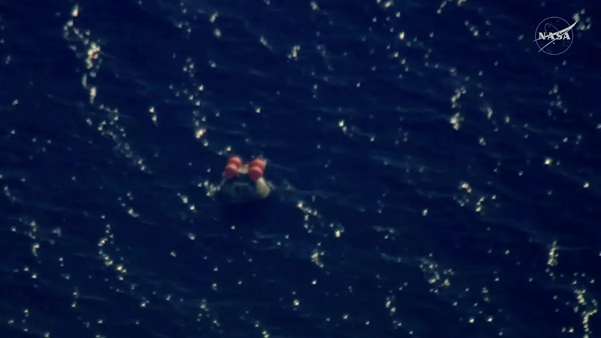 2026-04-11T001208Z_1049561833_RC2OMKAK1J1D_RTRMADP_3_SPACE-MOON-ARTEMIS