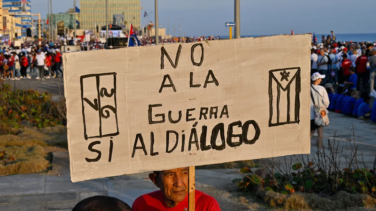 AFP__20260501__A9KJ2RW__v1__HighRes__CubaPoliticsSocialLabourMayDayDemo