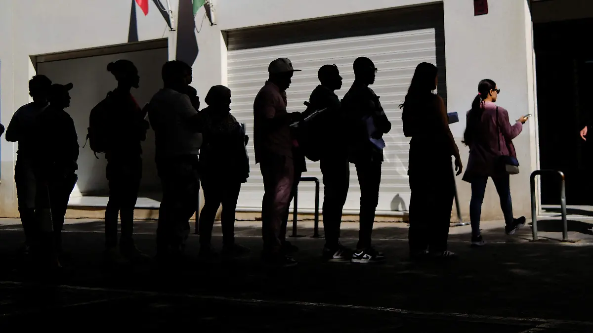 2026-04-20T133435Z_1881131355_RC2XSKA4T2H0_RTRMADP_3_SPAIN-MIGRATION