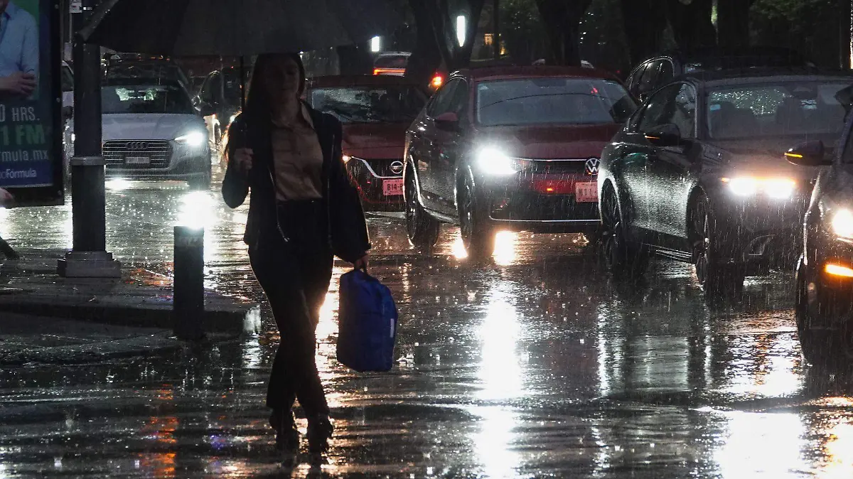 1081589_Lluvias en la capital_web