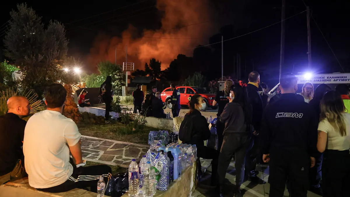 2026-07-05T080451Z_963492576_RC2D7MAL0WG4_RTRMADP_3_EUROPE-WEATHER-GREECE-WILDFIRE