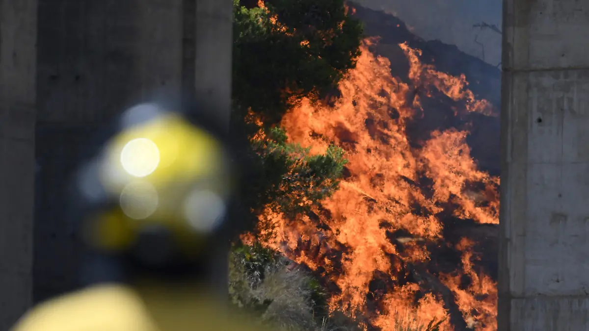 AFP__20260710__B9UX7C8__v2__HighRes__SpainFireEmergency