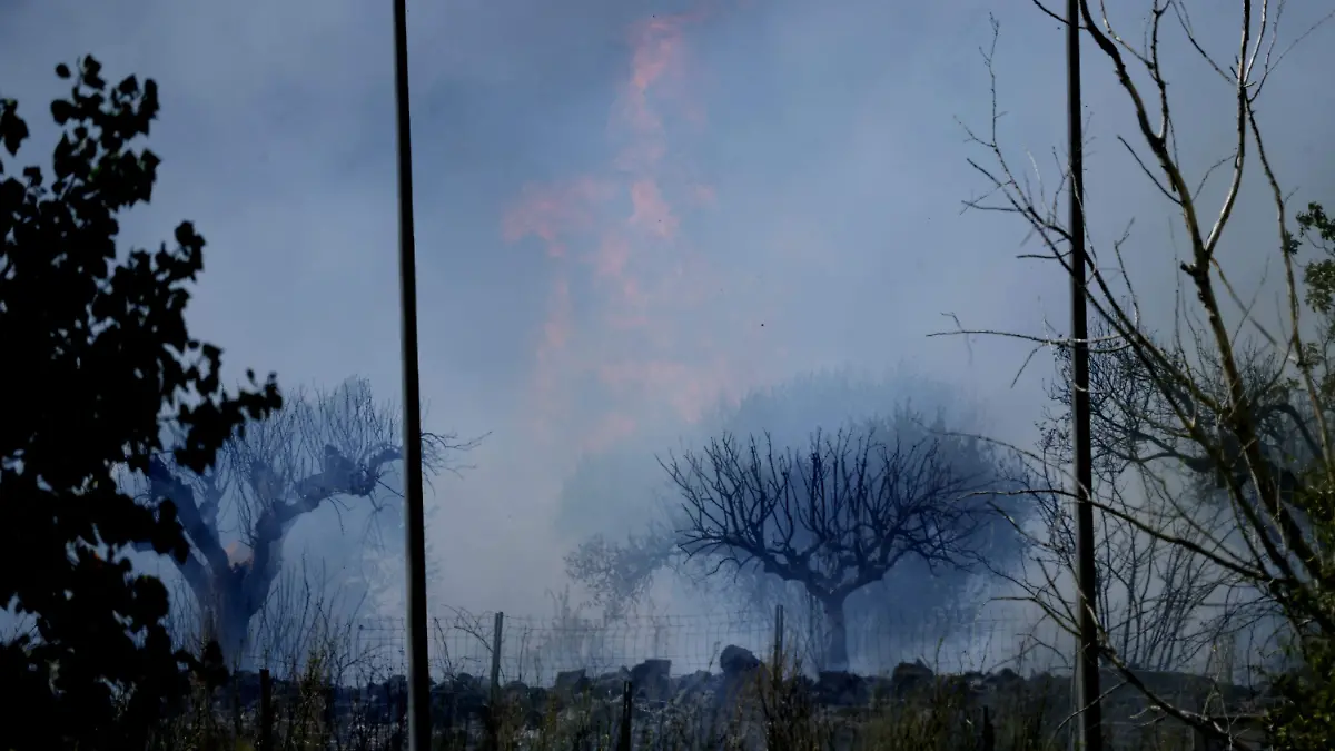 AFP__20260726__C38Y4EU__v1__HighRes__SpainWildfireEmergencyGovernmentClimate