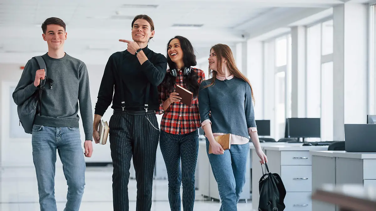 joking-around-group-young-people-walking-office-their-break-time (1)